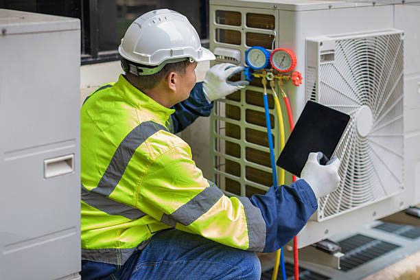 Professional Hvac Maintenance technician working in Grant, FL